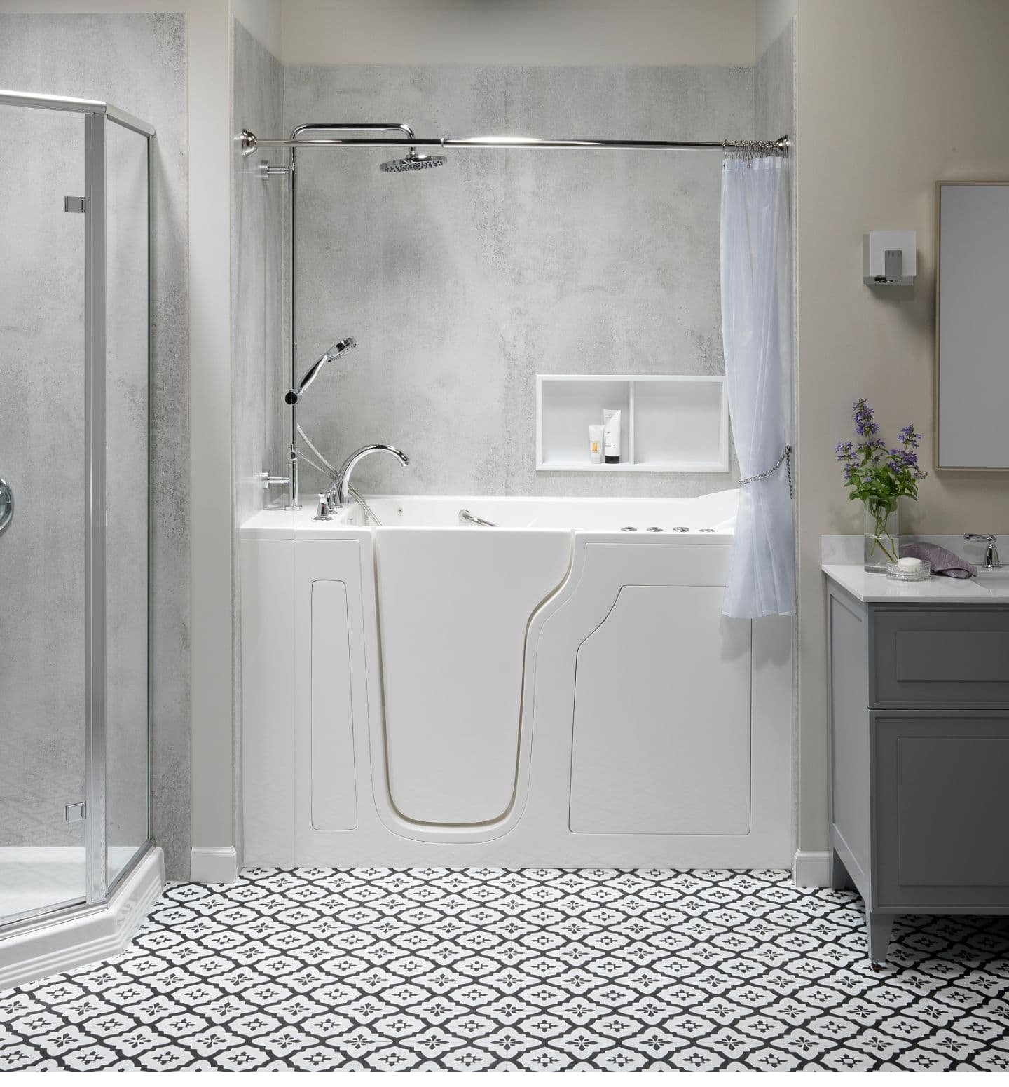 A white bathroom with a walk-in bathtub and gray textured walls.